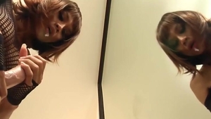 Redhead Ladyboy In black lingerie Sucks A dildo By The Mirror